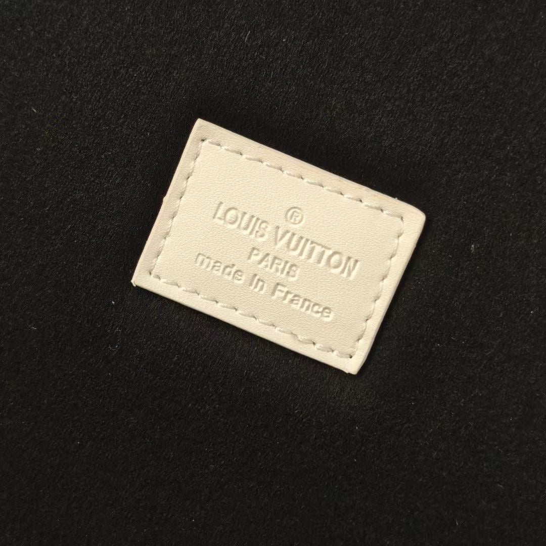 Louis Vuitton "Made in France" label on black interior