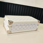 Louis Vuitton monogram jewelry box with gold-tone corner hardware and hinged lid