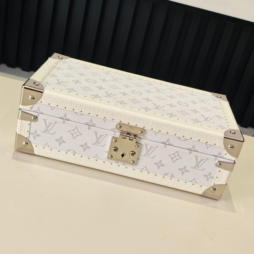 Louis Vuitton monogram jewelry box, light color with silver lock and corner feet
