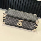 Checkered storage case with studded trim and metal clasp, closed