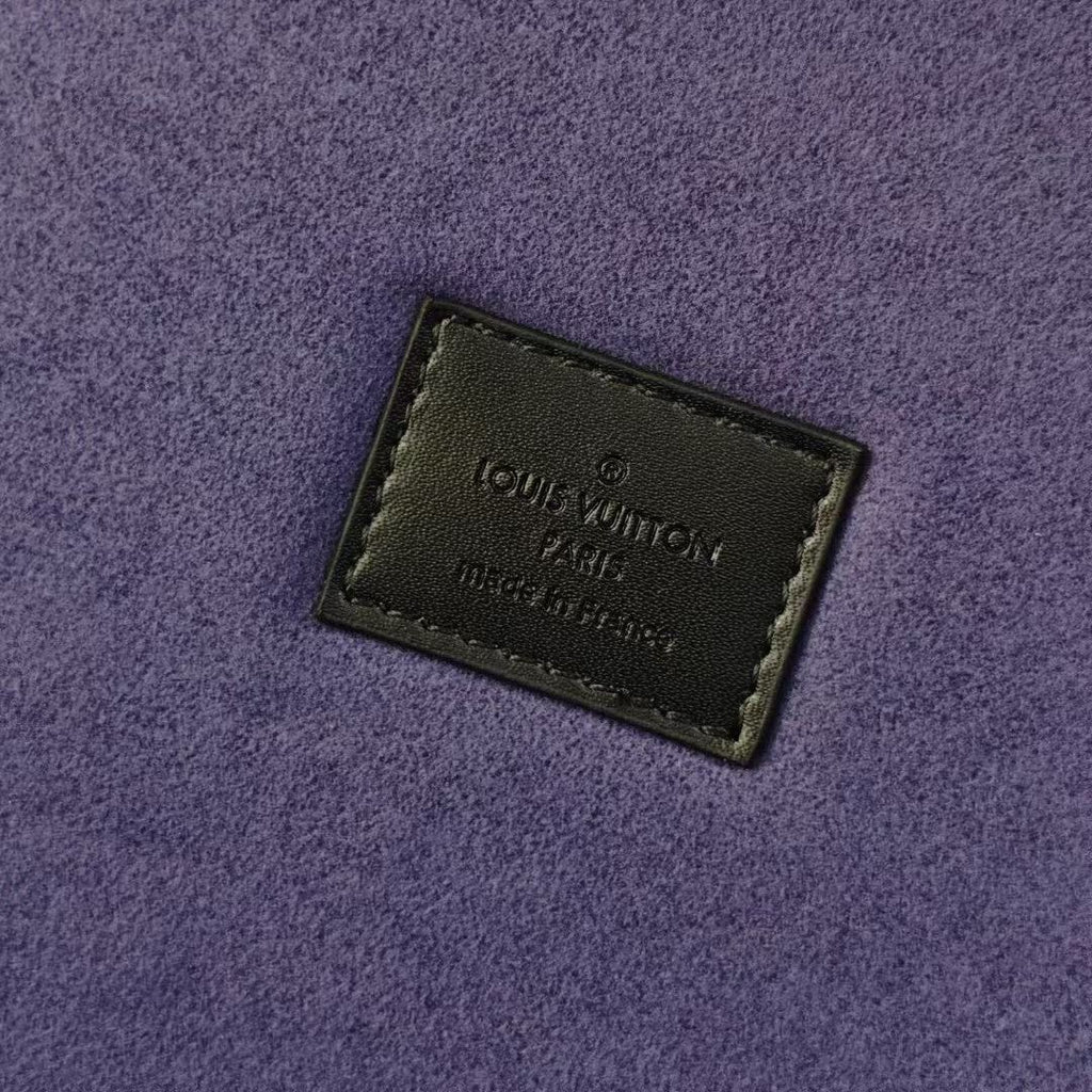 Purple label patch with Louis Vuitton Paris Made in Italy text on lining