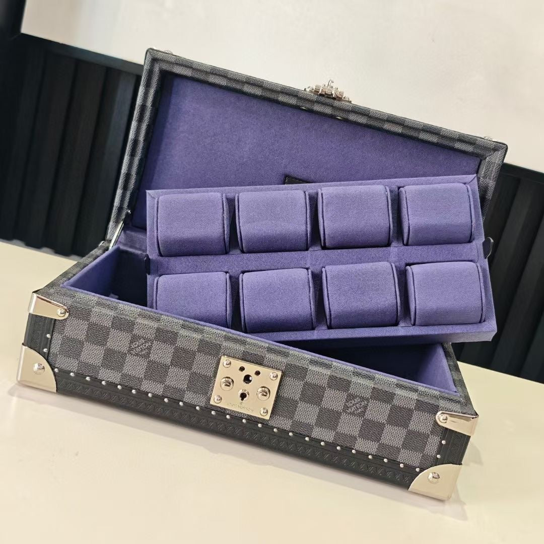Checkered storage case open with purple organizer cushions for accessories