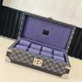 Louis Vuitton checkered storage case with purple velvet interior and open lid