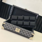 Louis Vuitton check-pattern jewelry case open with padded black dividers