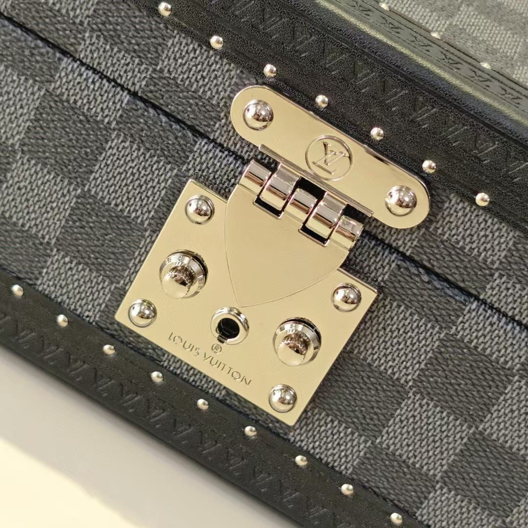 Louis Vuitton metal lock plate with keyhole on check-pattern case