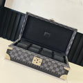 Louis Vuitton check-pattern jewelry case with hinged open lid and padded inserts