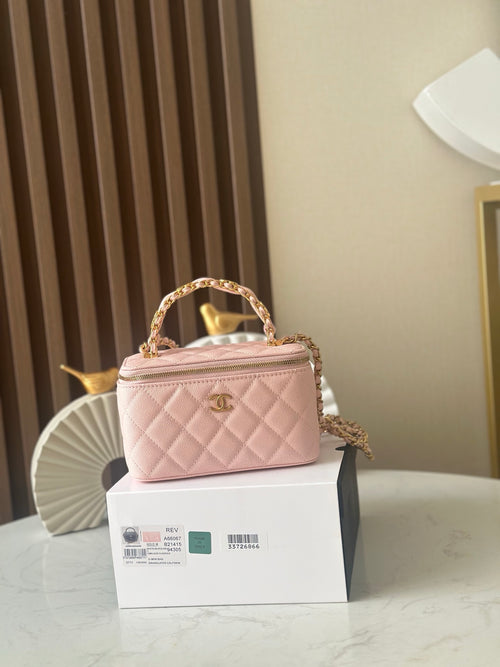 Chanel mini quilted bag in light pink with top handle and gold-tone chain strap