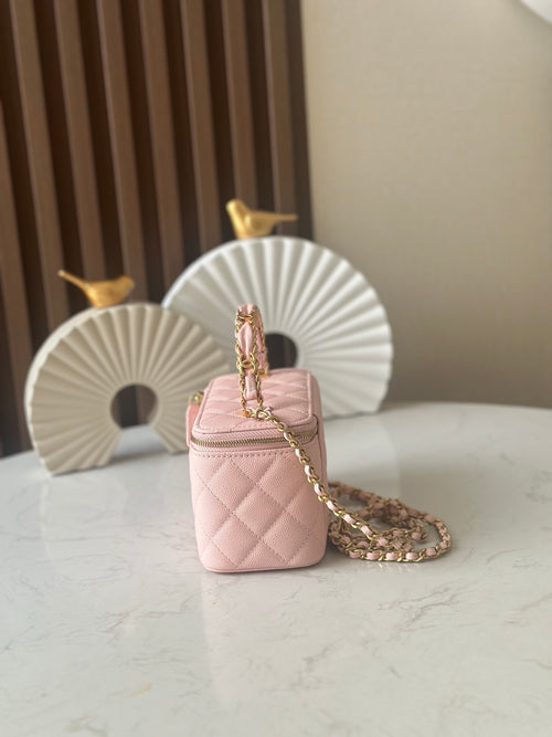 Chanel mini quilted bag in light pink with gold-tone chain crossbody strap