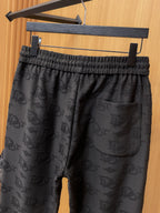 Black Dior monogram jogger pants with side pocket and elastic waist