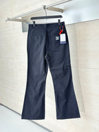 Navy straight-leg pants with front pockets, belt loops, and small side logo