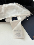 Louis Vuitton pants care label with size 48 tag, inner waistband detail