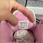 Pink sneaker interior size label: Balenciaga, UK 38 (shown on tag).