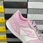 Pink and white low-top Balenciaga sneaker, side logo and lace-up close-up.