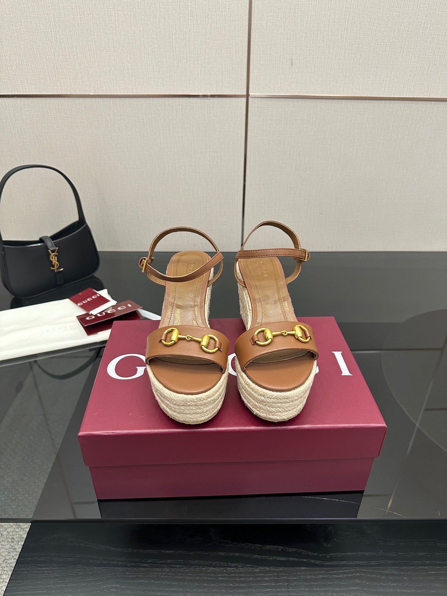 Women's tan leather espadrille wedge sandals with gold-tone buckle straps