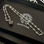 Silver-tone cross-link chain necklace with square pendant on black gift box