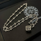 Silver-tone cross-link chain necklace with square pendant, ring charm, and clasp