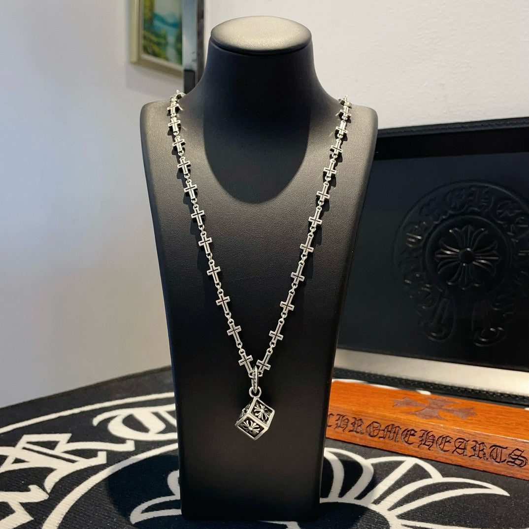 Silver-tone cross-link chain necklace with square pendant and dangling charm