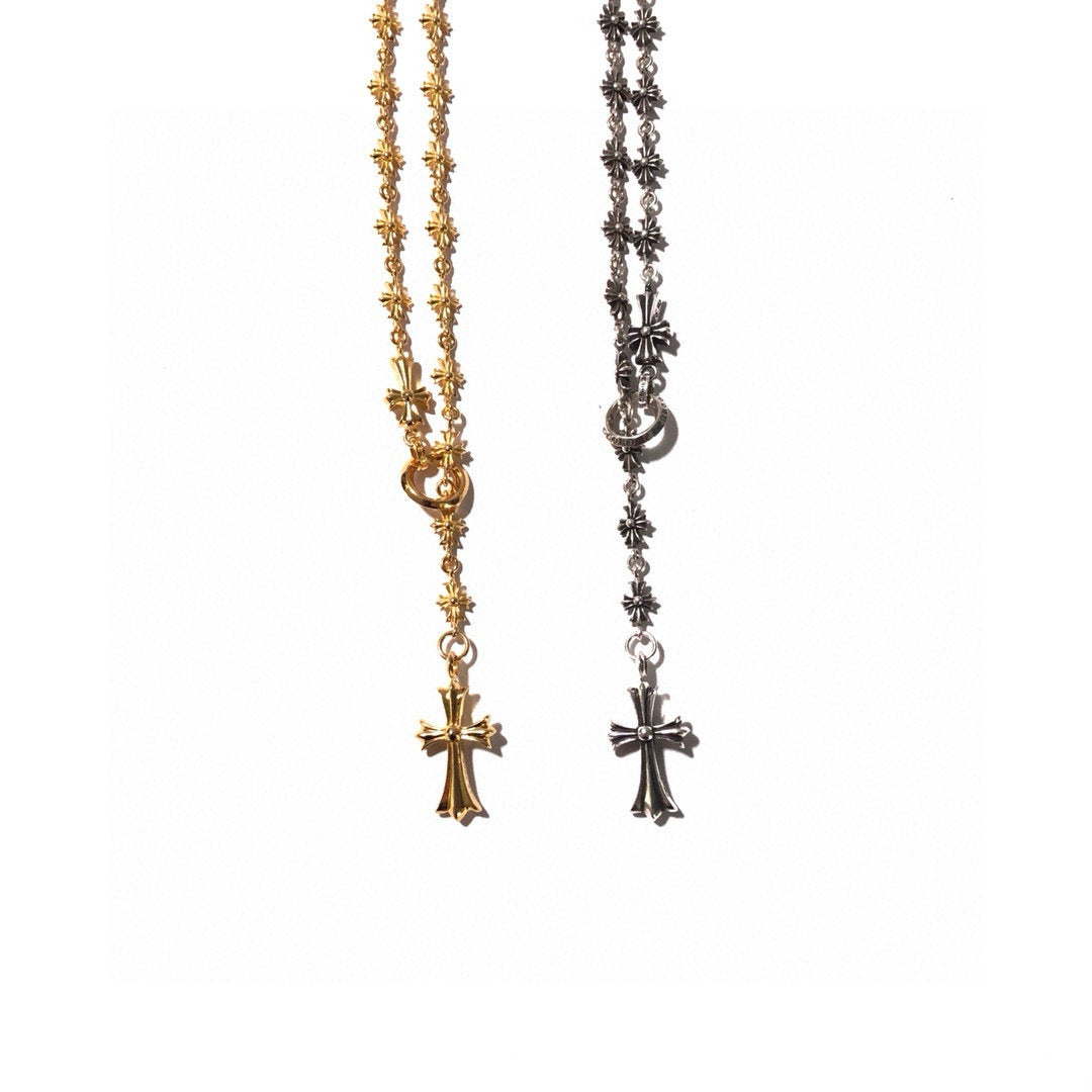 Gold and silver chain necklaces with cross pendants