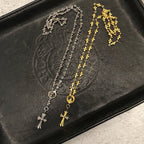 Silver and gold chain necklaces with star and cross pendants