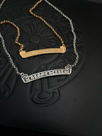 Layered bar pendant necklaces with gold and silver tone chains and engraved pendants