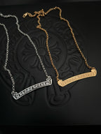 Bar pendant necklaces with chains in silver and gold tones