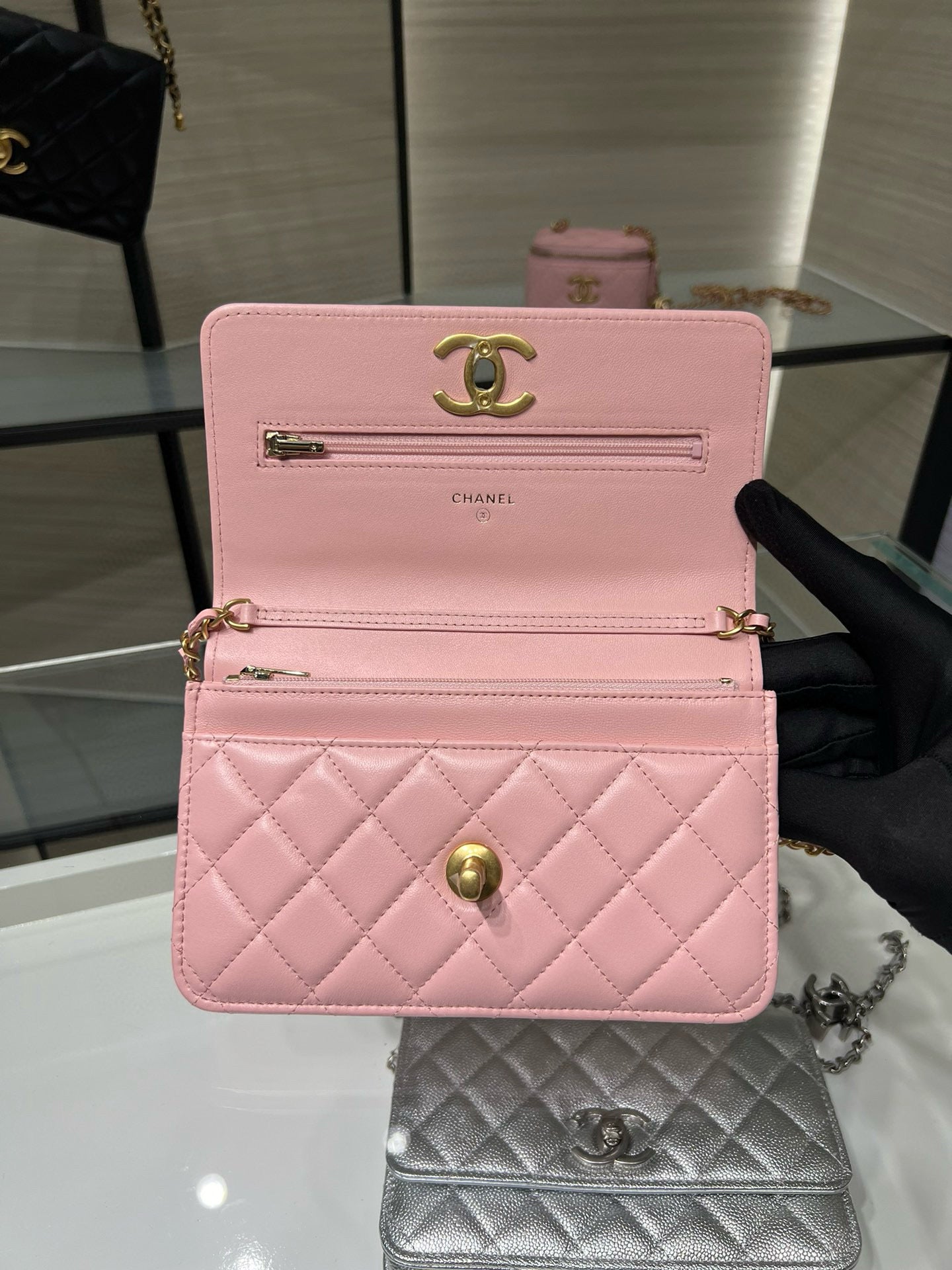 Chanel pink quilted mini bag and small metallic gray flap bag with chain