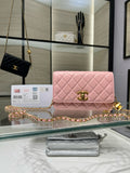 Chanel quilted pink flap crossbody bag with gold-tone chain and clasp