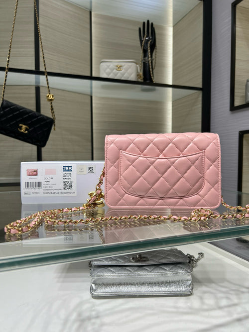 Chanel quilted pink flap shoulder bag with gold-tone chain, front view