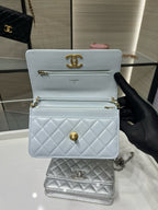 Chanel light blue quilted flap shoulder bag with gold CC logo and chain strap