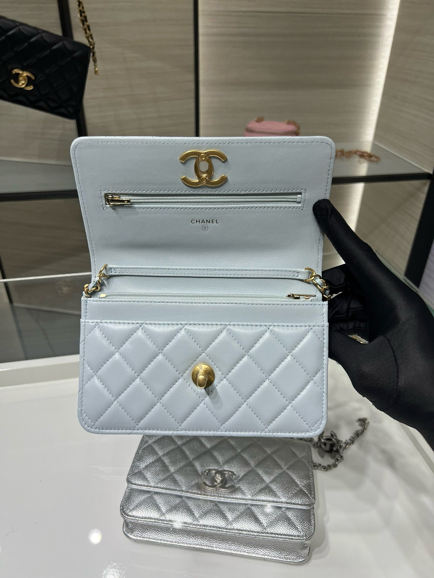 Chanel light blue quilted flap shoulder bag with gold CC logo and chain strap