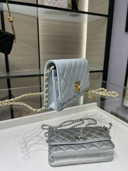Chanel quilted shoulder bag in light blue with gold chain and flap clasp