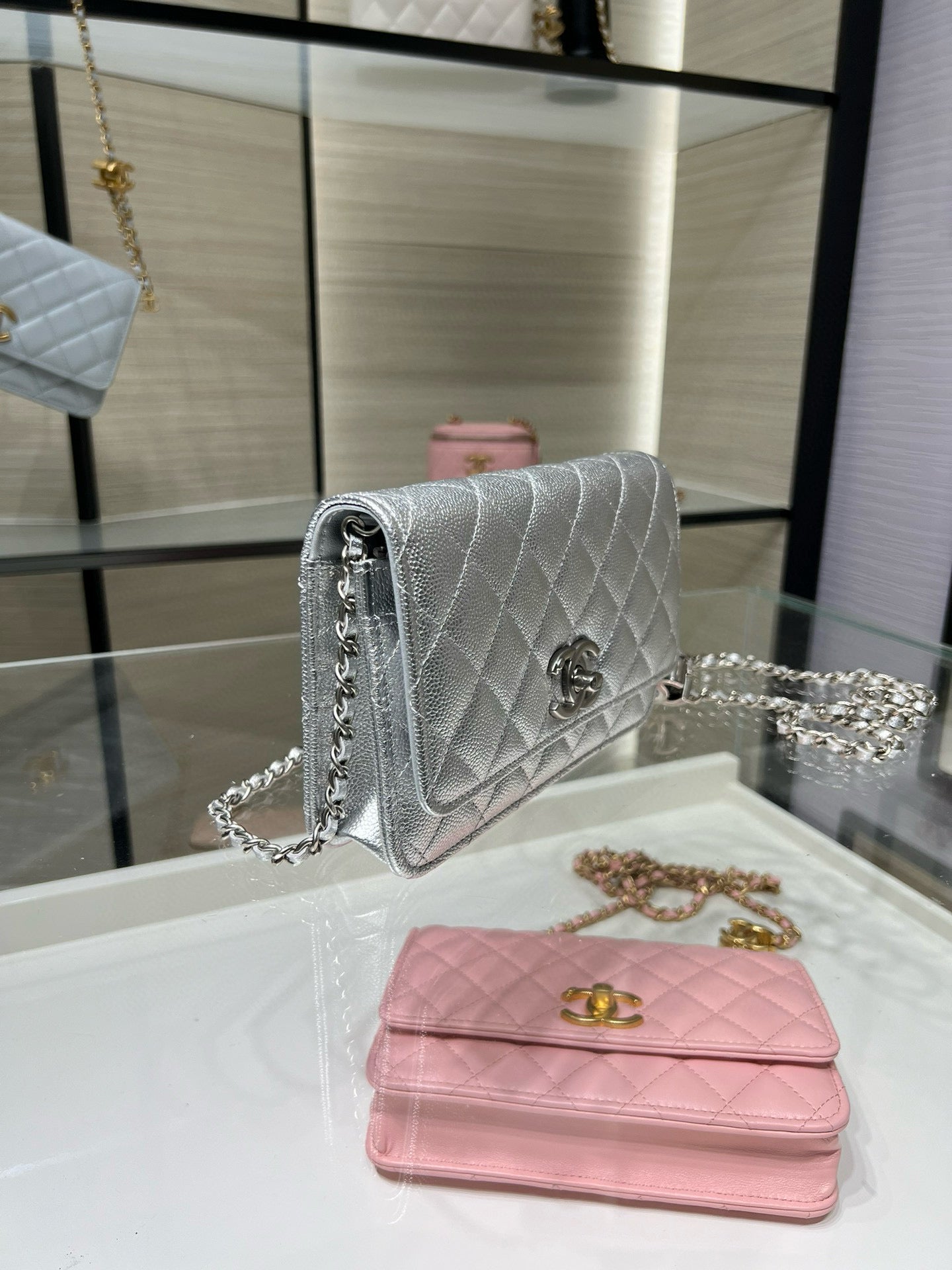 Silver Chanel quilted flap bag with chain strap and logo clasp