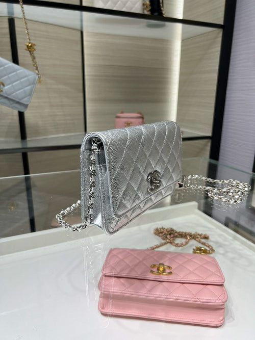 Silver Chanel quilted flap bag with chain strap and logo clasp