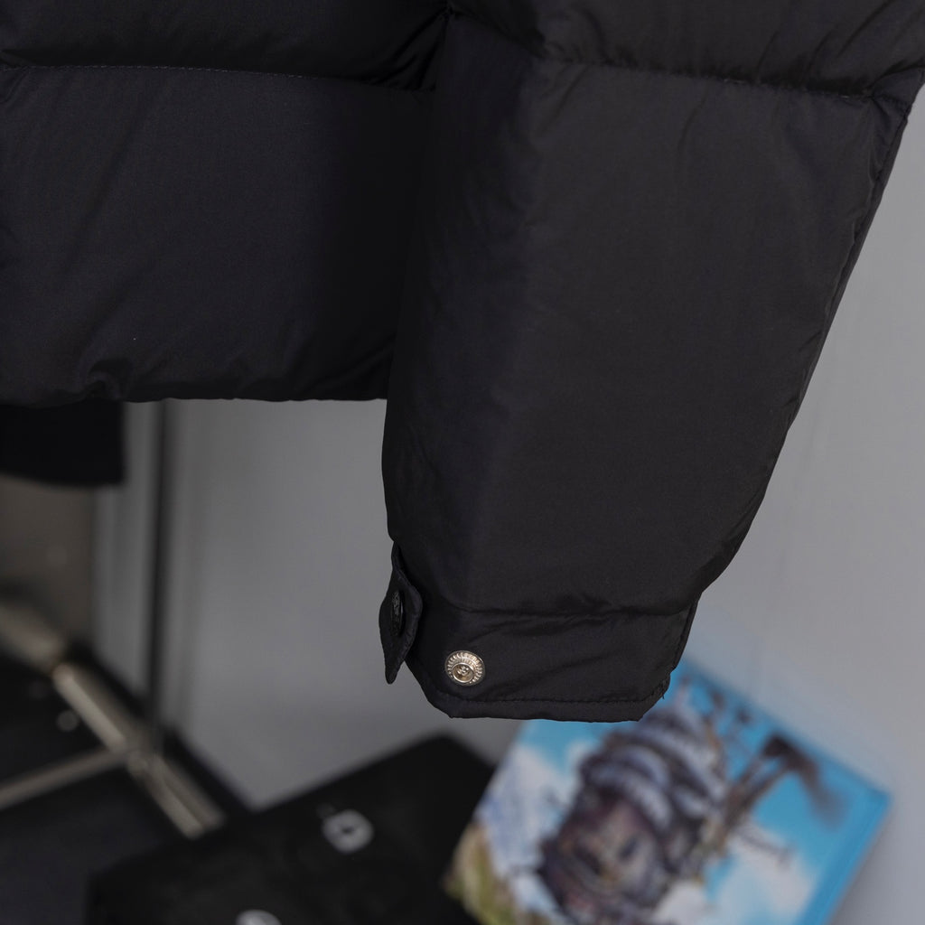 Long puffer jacket cuff with snap button and stitched trim