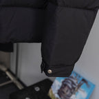 Long puffer jacket cuff with snap button and stitched trim