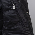 Moncler long puffer jacket front zipper with branded pull and stitched panels