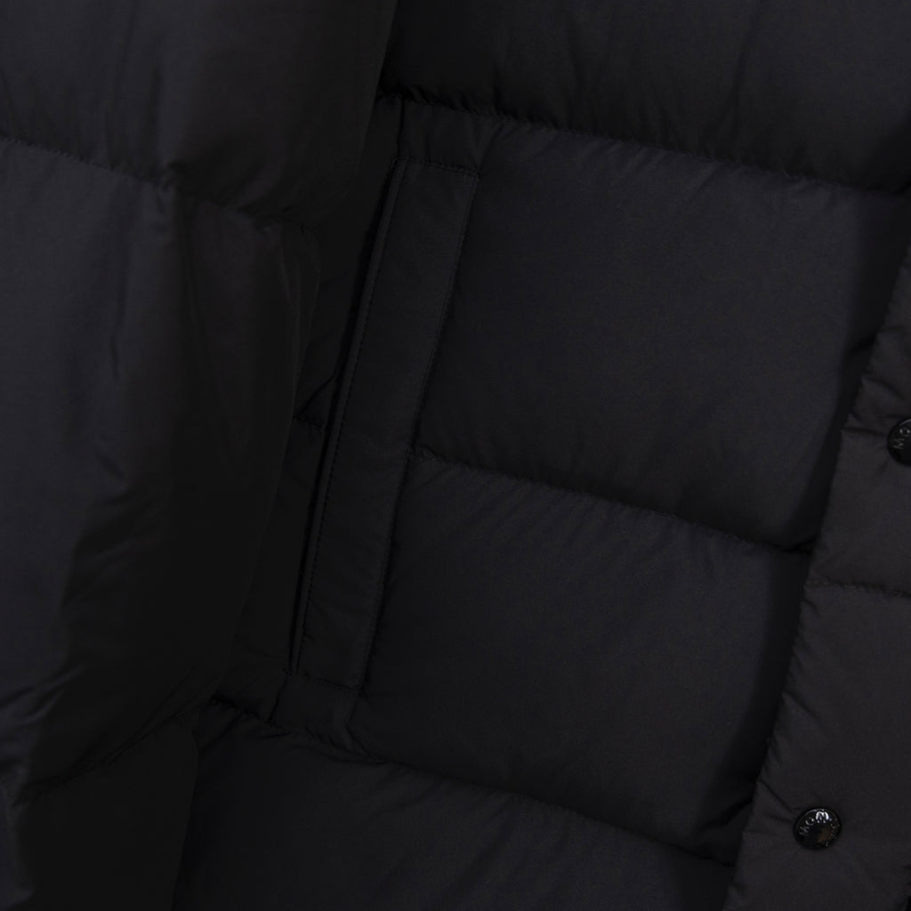Long puffer jacket front with zipper and horizontal quilted sections
