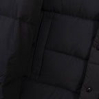 Long puffer jacket front with zipper and horizontal quilted sections