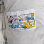White puffer jacket inner care label with illustrated instructions