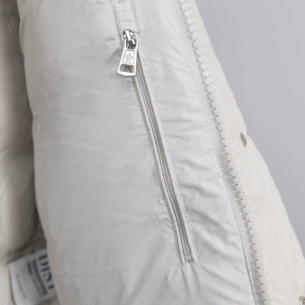 Moncler long white puffer coat front zipper and pull tab