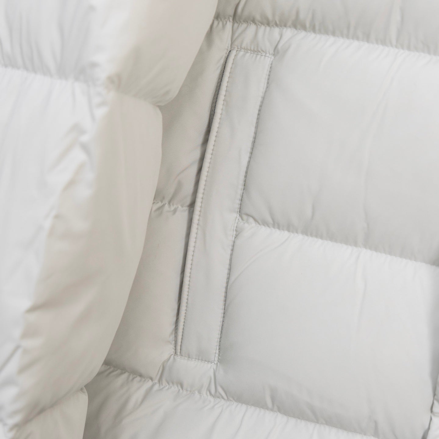 Moncler long white puffer coat inner seam and quilted side panel