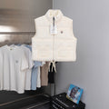 Moncler cream padded sleeveless vest with zip and small logo patch
