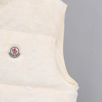 Moncler cream padded sleeveless vest side with round logo patch