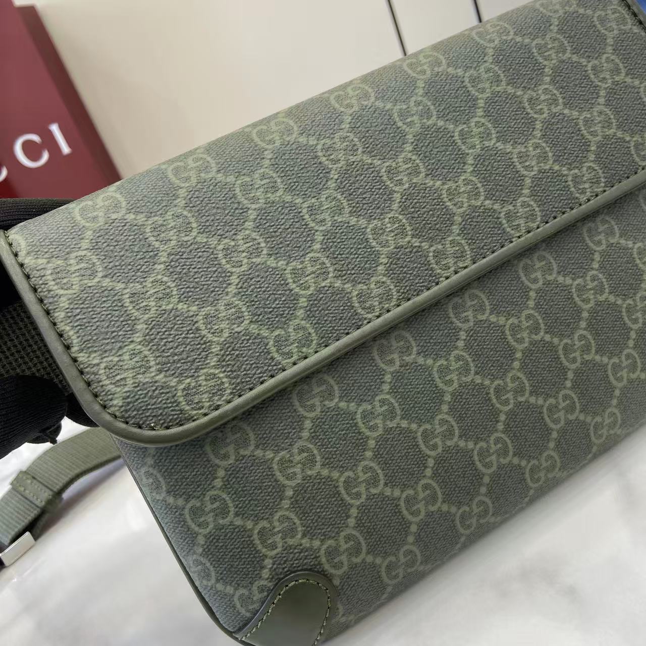 Gucci GG monogram canvas bag corner, green textured trim and stitching detail.