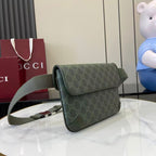 Gucci bag with GG monogram flap, green crossbody strap, angled side view.