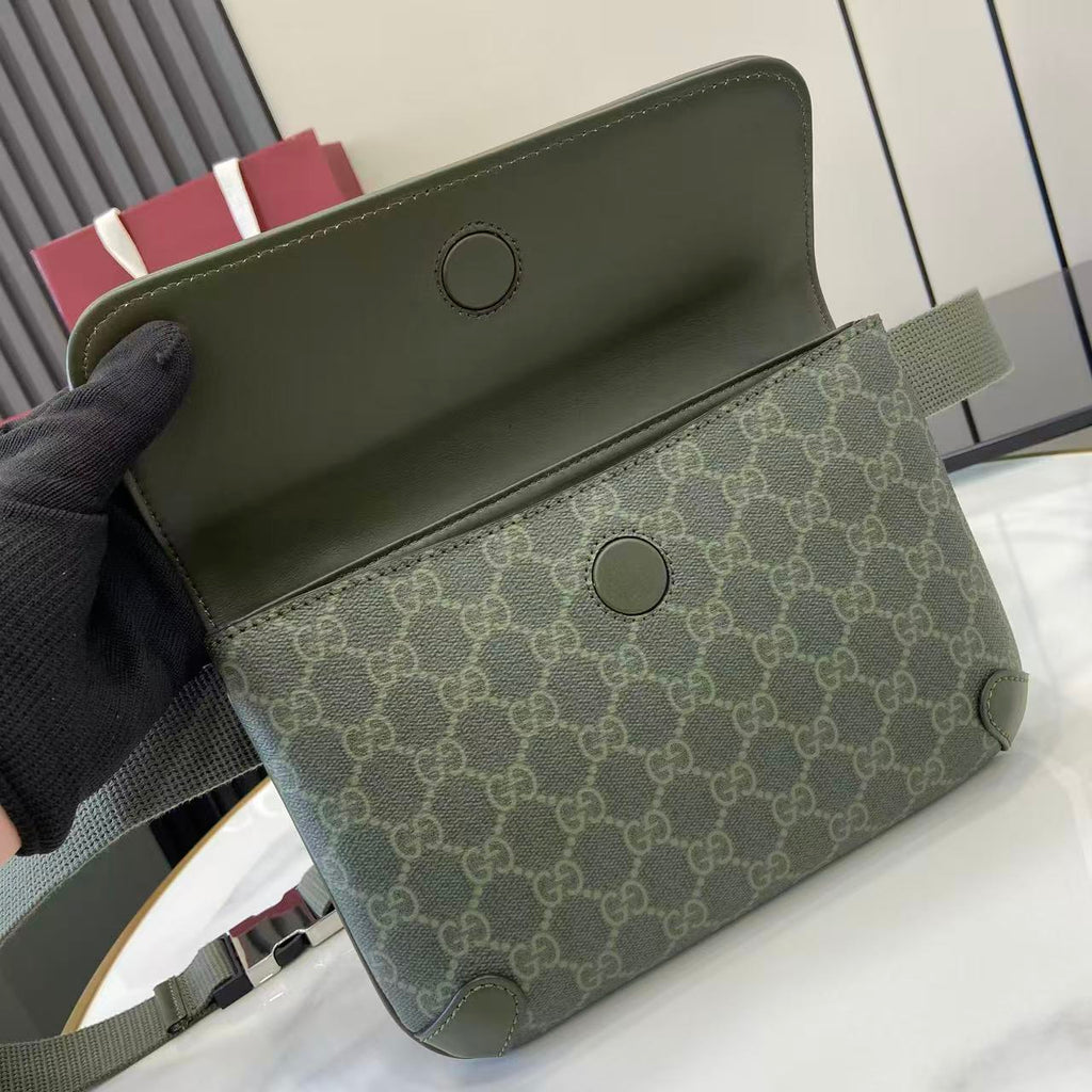 Gucci bag interior view: khaki lining and green exterior with snap details.