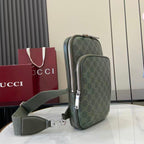 Gucci bag dark green monogram with dual-zip front pockets and adjustable strap