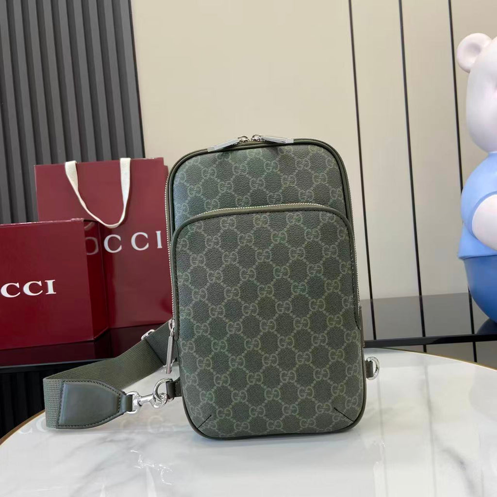 Gucci bag in dark green monogram canvas with top zip and detachable strap