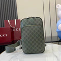 Gucci bag in dark green monogram canvas with top zip and detachable strap