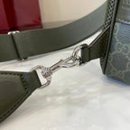Gucci bag crossbody strap with dark green webbing and metal lobster clasps